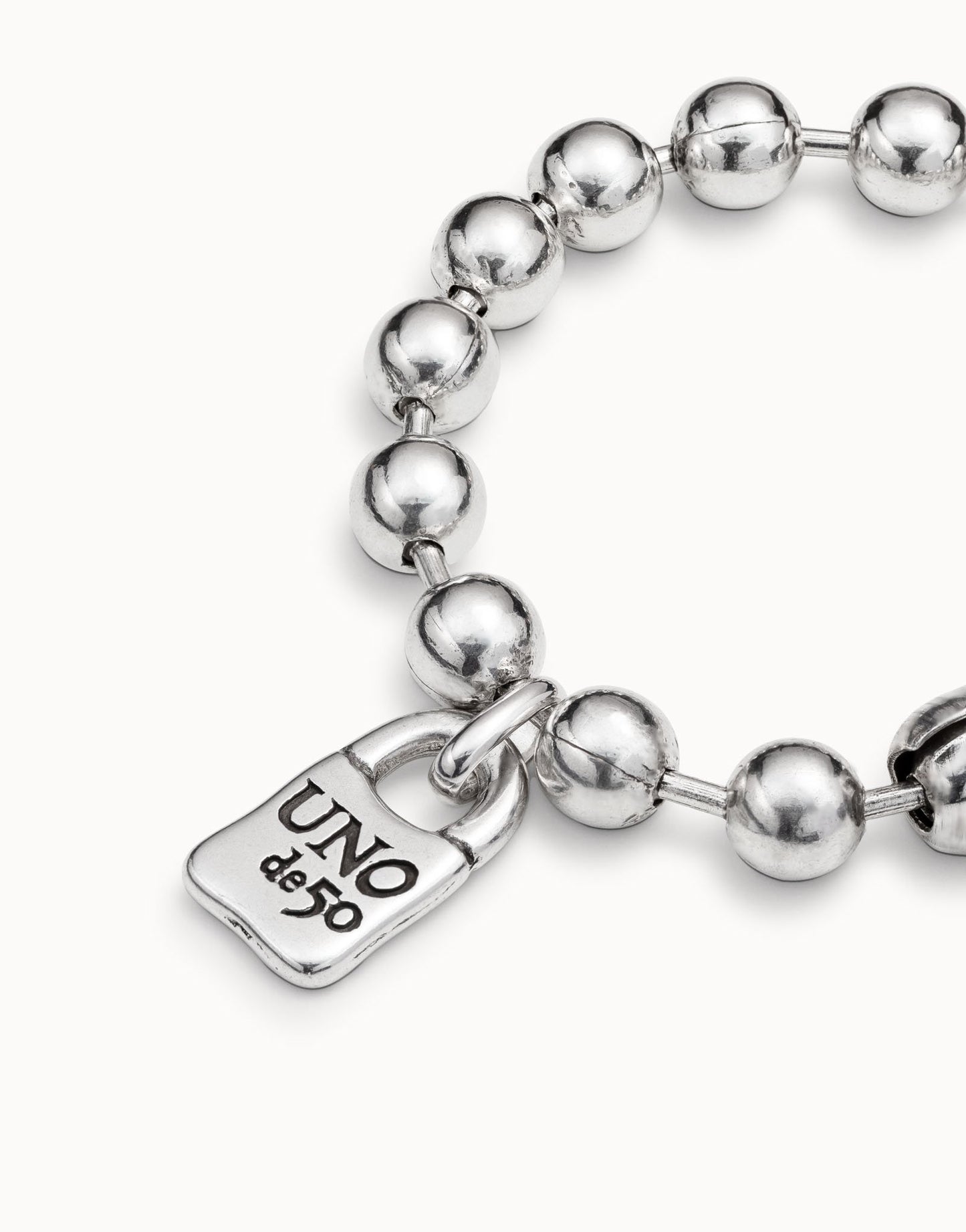 Beaded Bracelet with a Padlock Charm